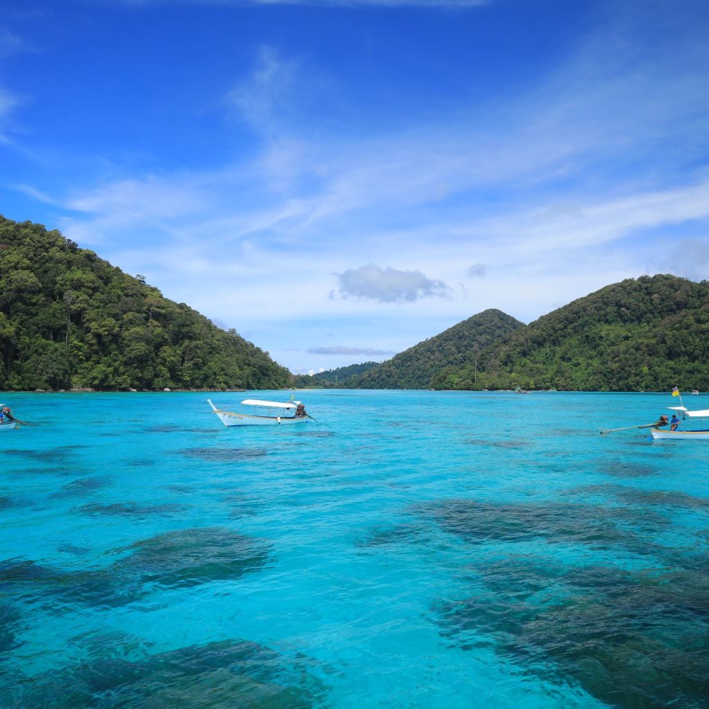 Turquoise bay and forested hills at Surin Islands National Park